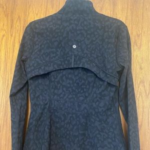 Black leopard print lululemon jacket.